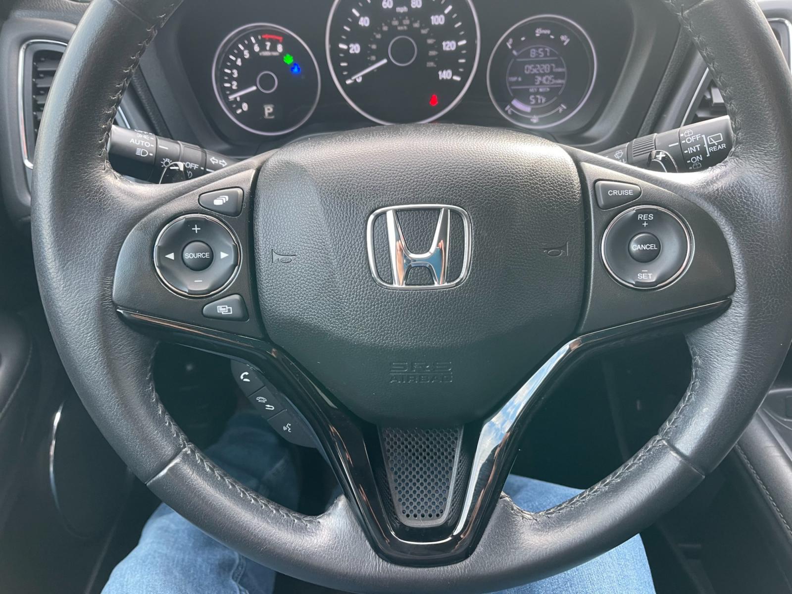 2018 Blue /Black Honda HR-V EX-L w/Navigation 4WD CVT (3CZRU6H71JM) with an 1.8L I4 DOHC 16V engine, Automatic transmission, located at 11115 Chardon Rd. , Chardon, OH, 44024, (440) 214-9705, 41.580246, -81.241943 - This 2018 Honda HR-V equipped with AWD (All Wheel Drive) and a 1.8L engine paired with a CVT (Continuously Variable Transmission) offers a blend of performance and efficiency. Its luxurious leather interior, complemented by heated seats and an automatic climate control system, ensures a comfortable - Photo #20